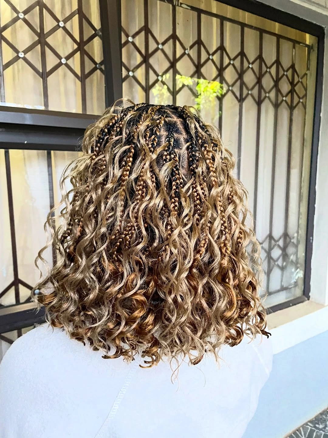 goddess braid Medium-Length Blonde Goddess Braids with French Curl Texture