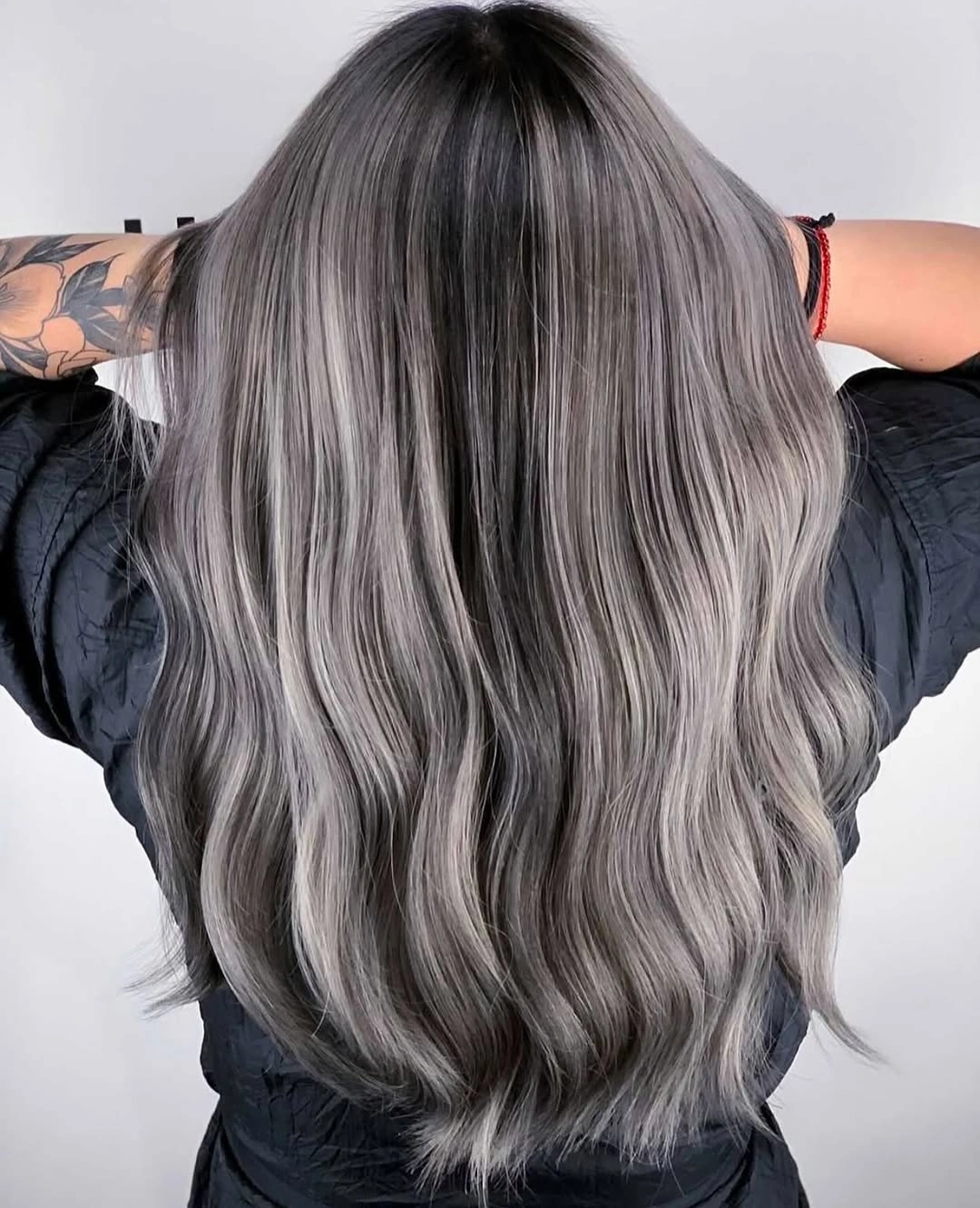 Hair Lowlights: Color Ideas and Inspiration Smoky Silver Dimension That Makes Long Hair Look Luxurious