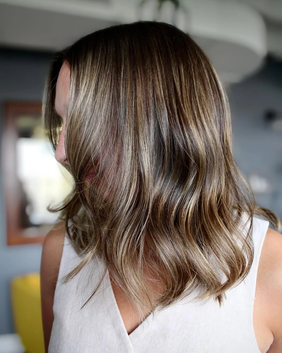Hair Lowlights: Color Ideas and Inspiration Soft Mushroom Brunette With Effortless Everyday Movement