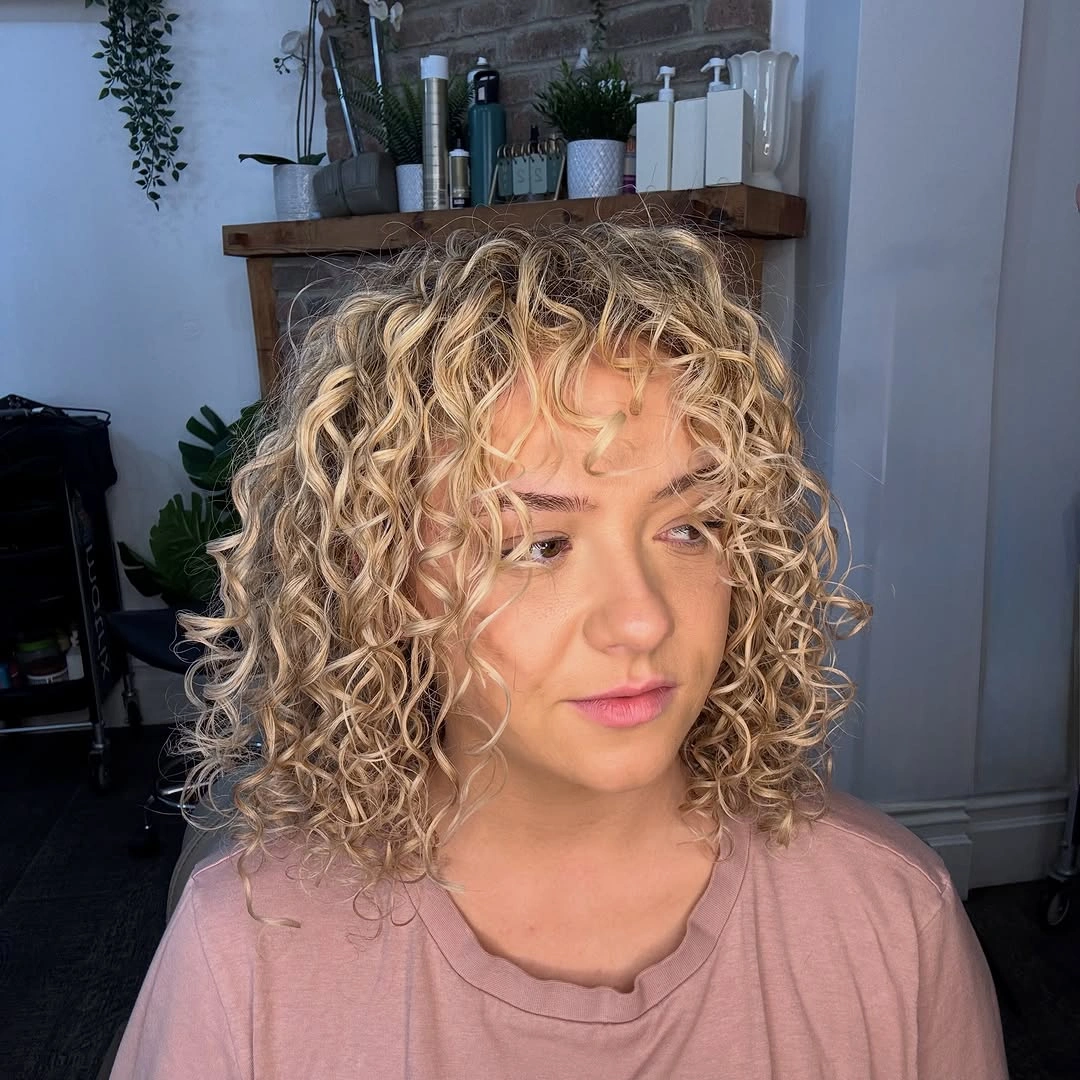 heatless curls hairstyle Defined Blonde Corkscrew Curls with Airy Volume