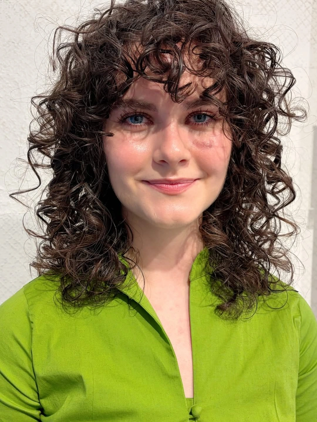 heatless curls hairstyle Playful Defined Ringlets with Soft Curly Bangs