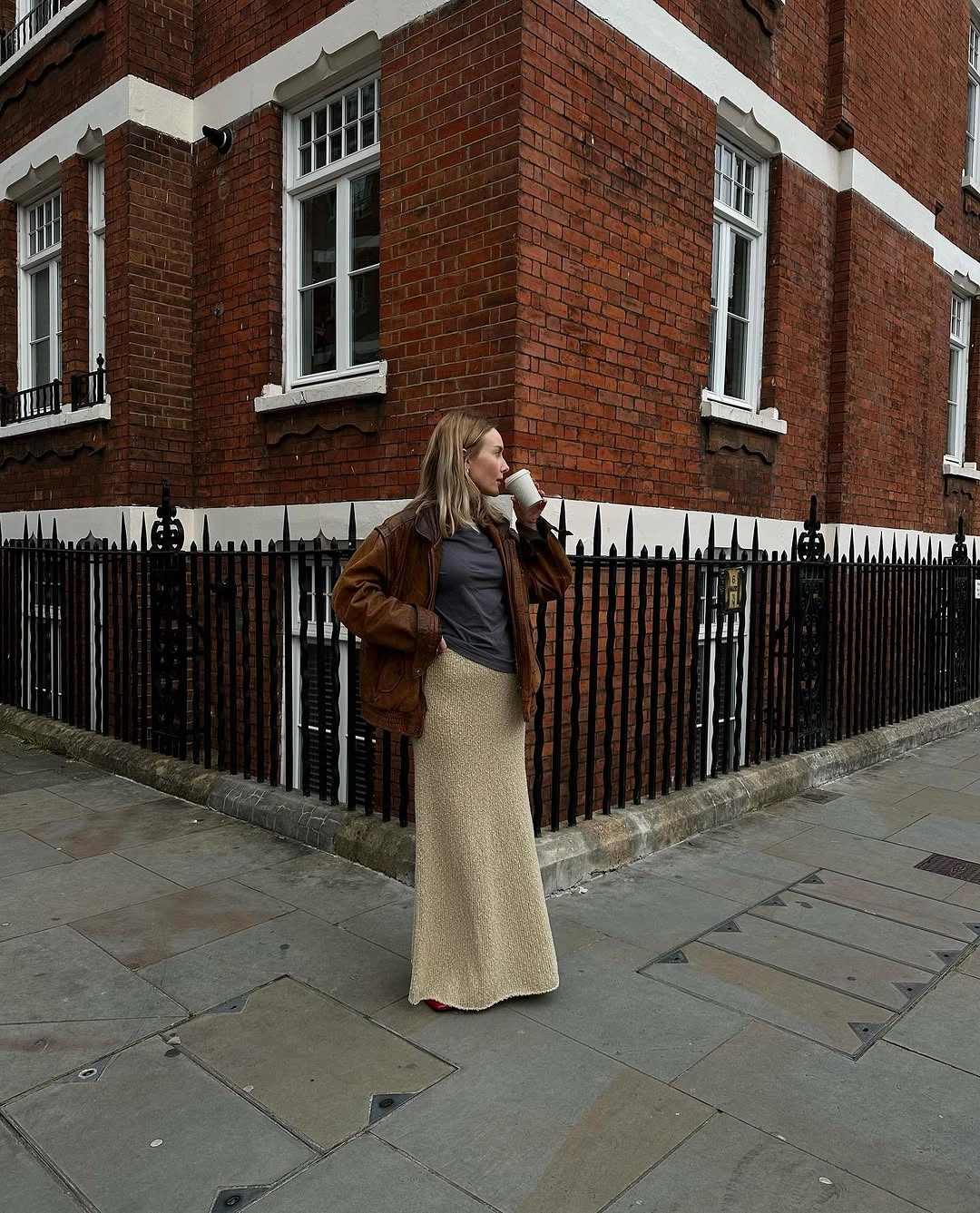 knit skirt outfits fall 2026 Relaxed City Layers With a Long Beige Knit Skirt
