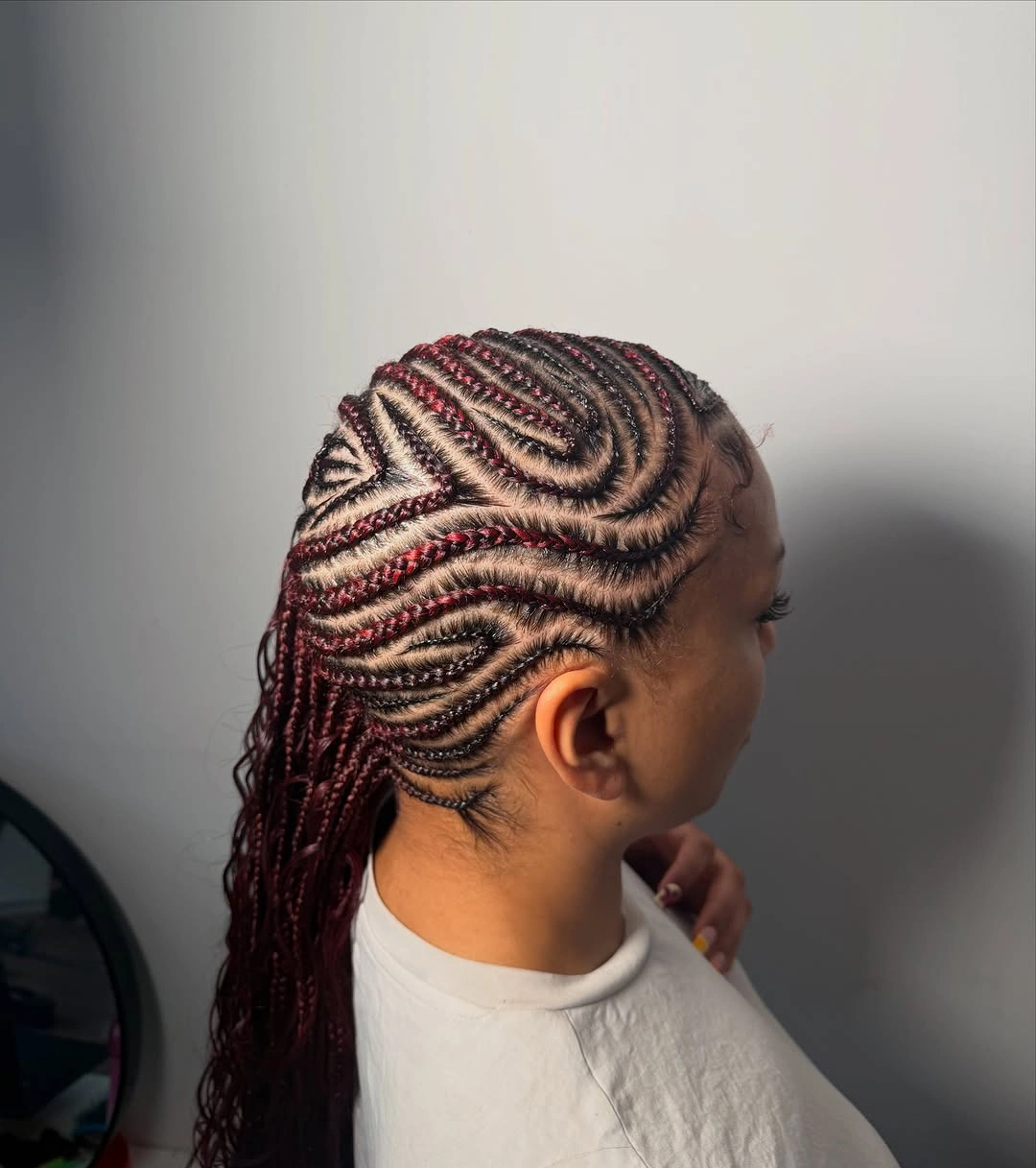 lemonade braid hairstyle Burgundy Lemonade Braids With Flowing Side Designs