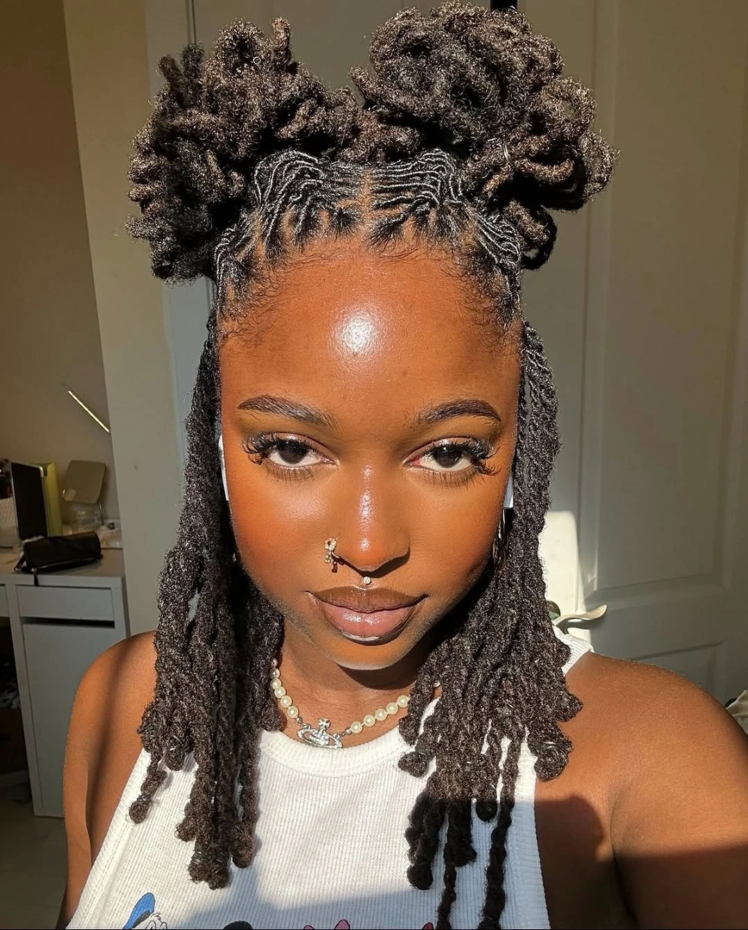 locs hairstyles for black women Elegant Half-Up Loc Style with Textured Buns