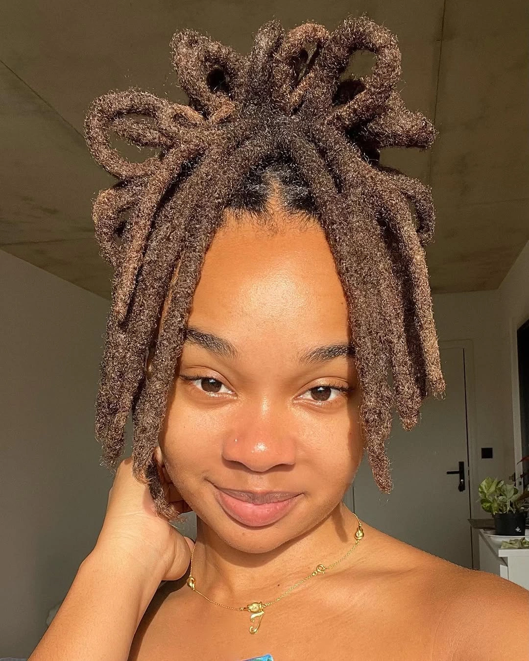 locs hairstyles for black women High Crown Locs with Sculptural Volume
