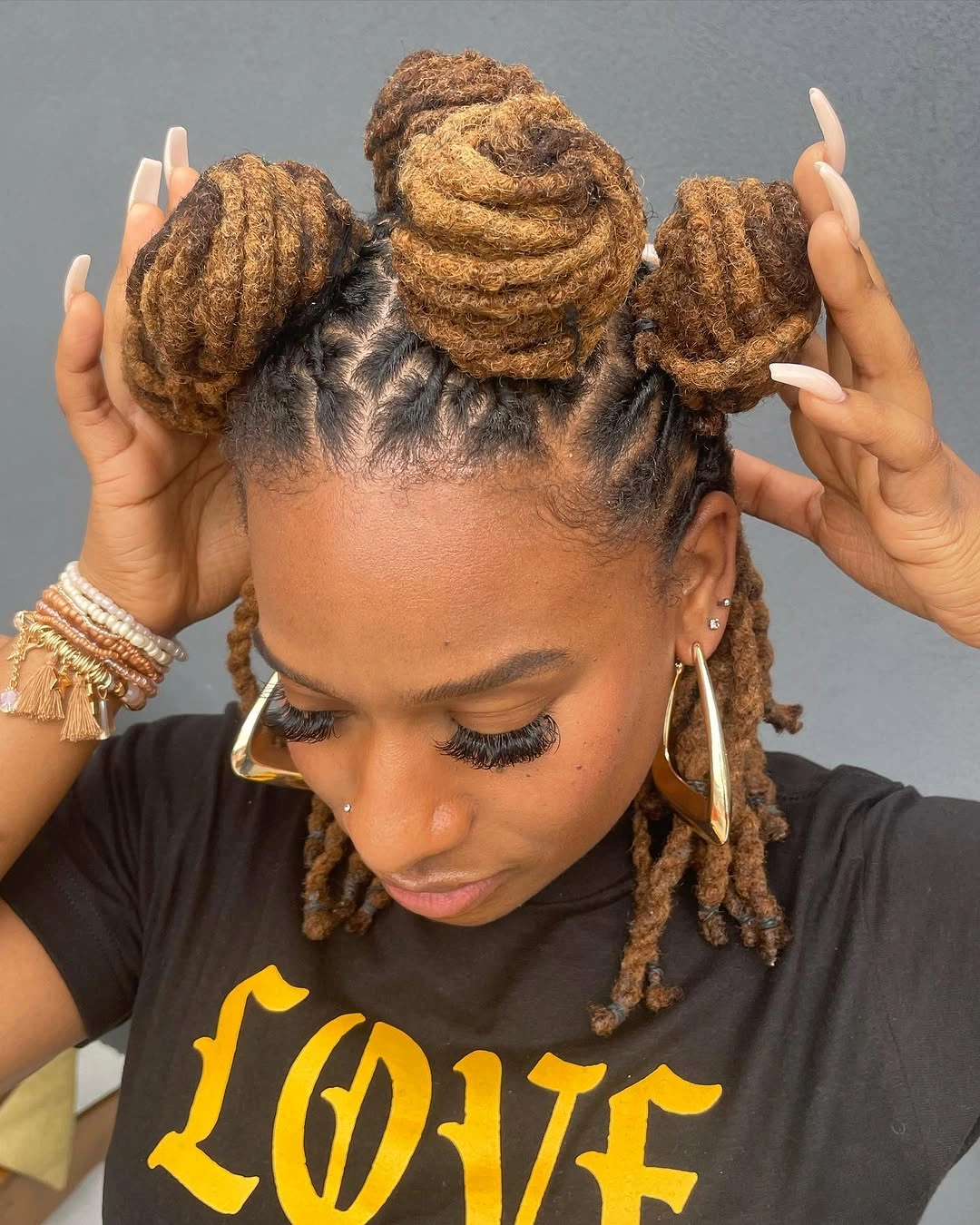 locs hairstyles for black women Triple Loc Buns with Golden Dimension