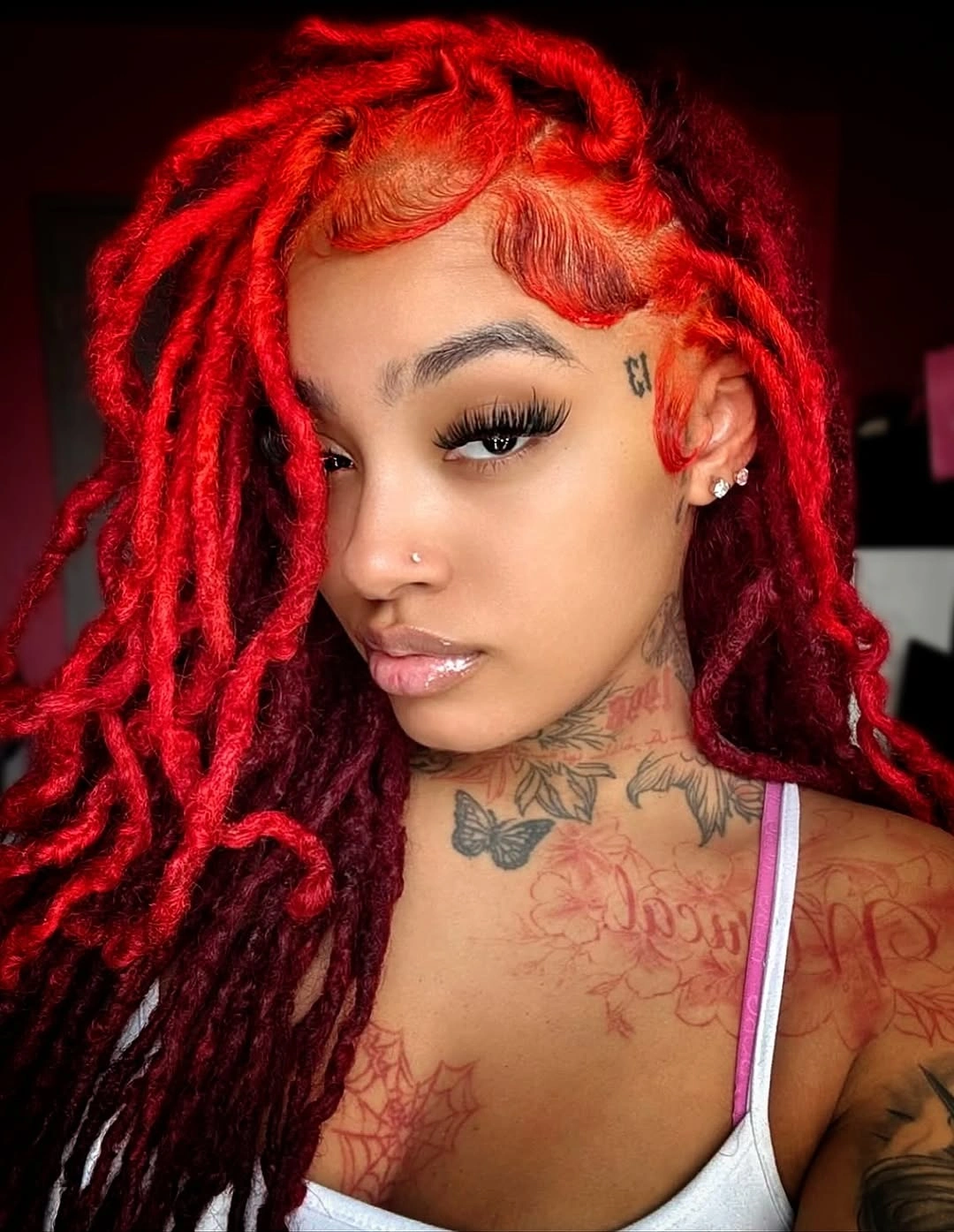 locs hairstyles for black women Bold Crimson Locs That Steal the Spotlight