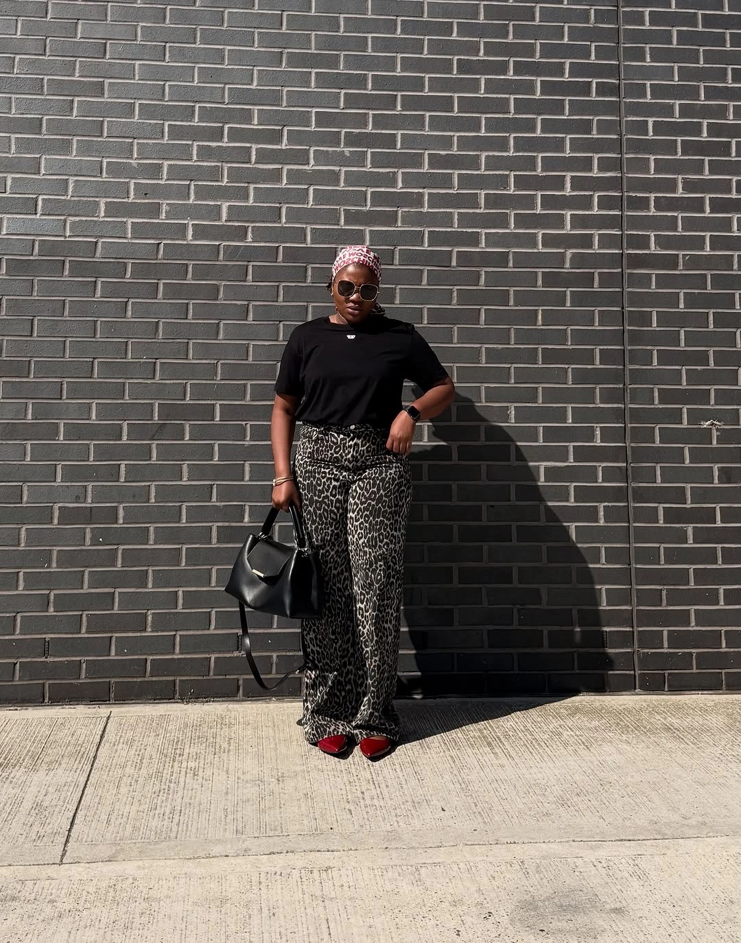 September fashion trends 2026 Black Tee With Leopard Trousers
