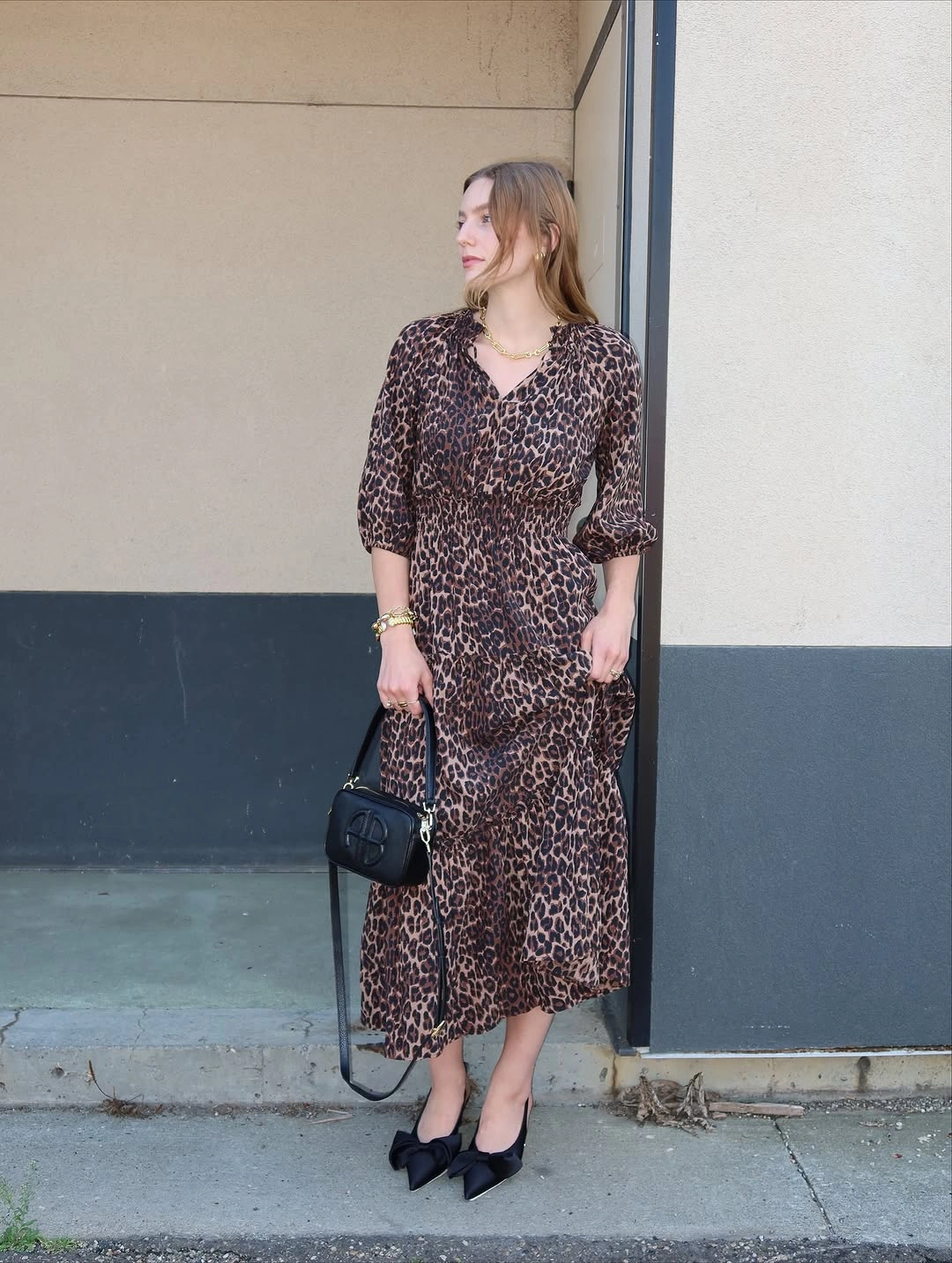 September fashion trends 2026 Leopard Midi Dress With Black Accessories