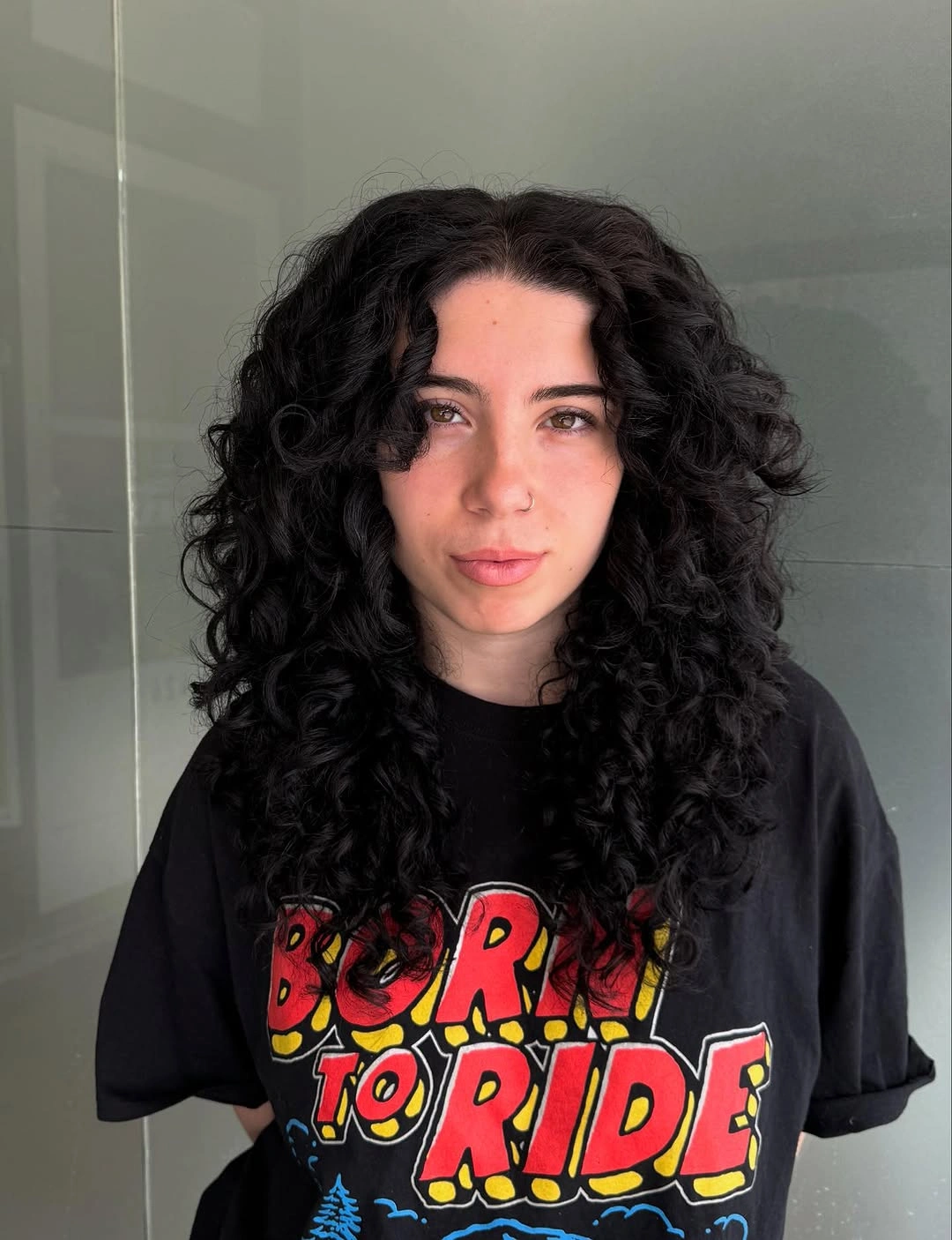 September hairstyles ideas 2026 Long Black Curls With Center Part