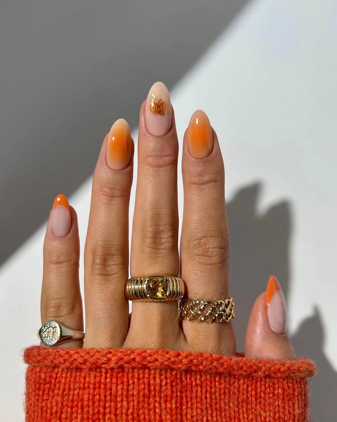 September nail art ideas 2026 Orange Gradient Tips With Tiny Gold Dots