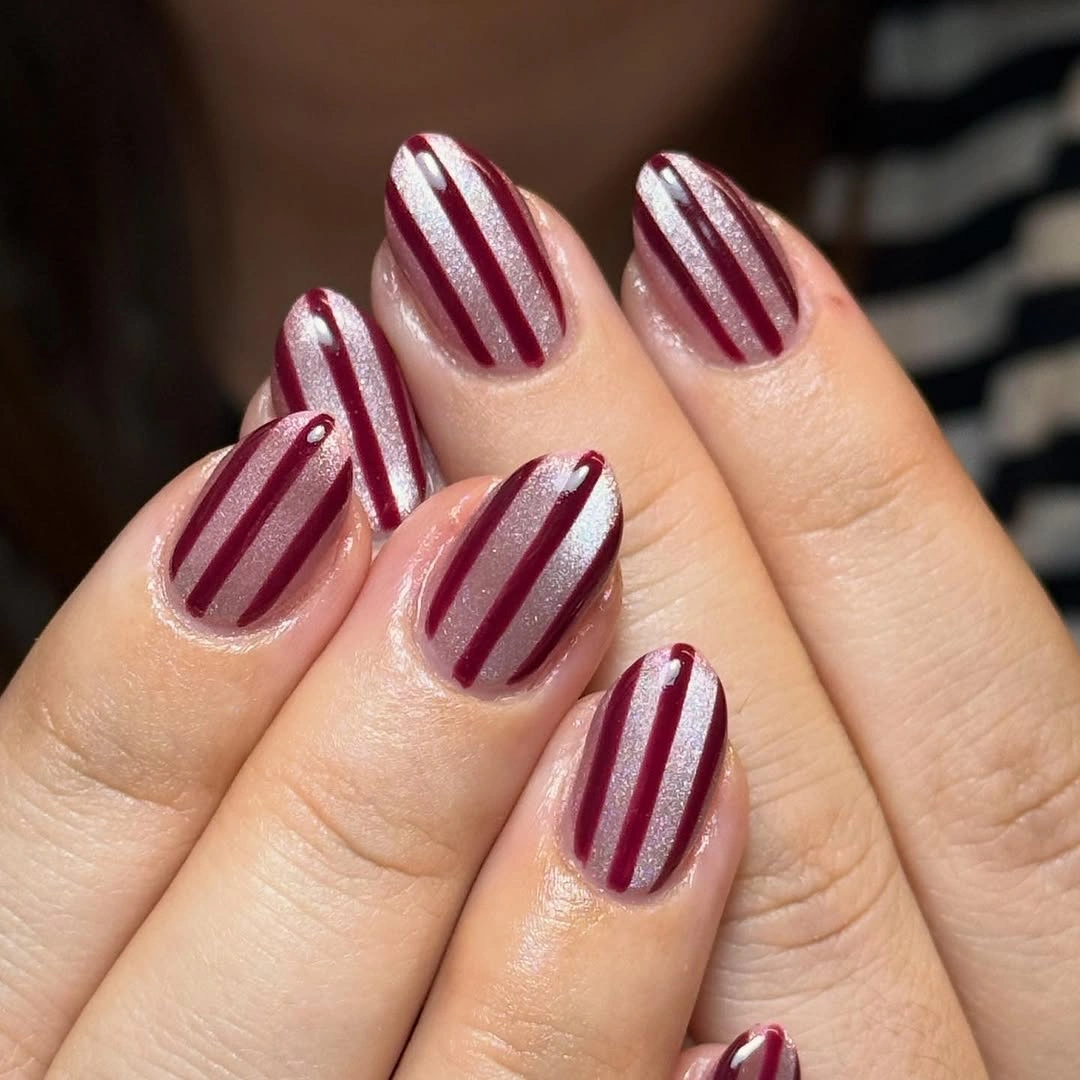 September nail art ideas 2026 Burgundy Vertical Stripe Nails With Clean Negative Space