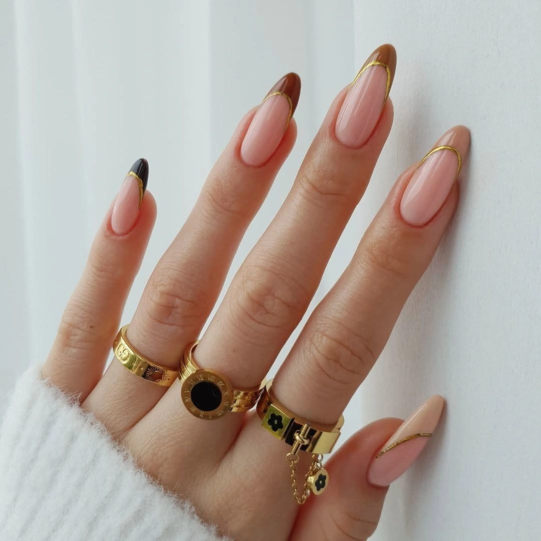 September nails color 2026 Nude Almond Nails With Thin Dark French Corners