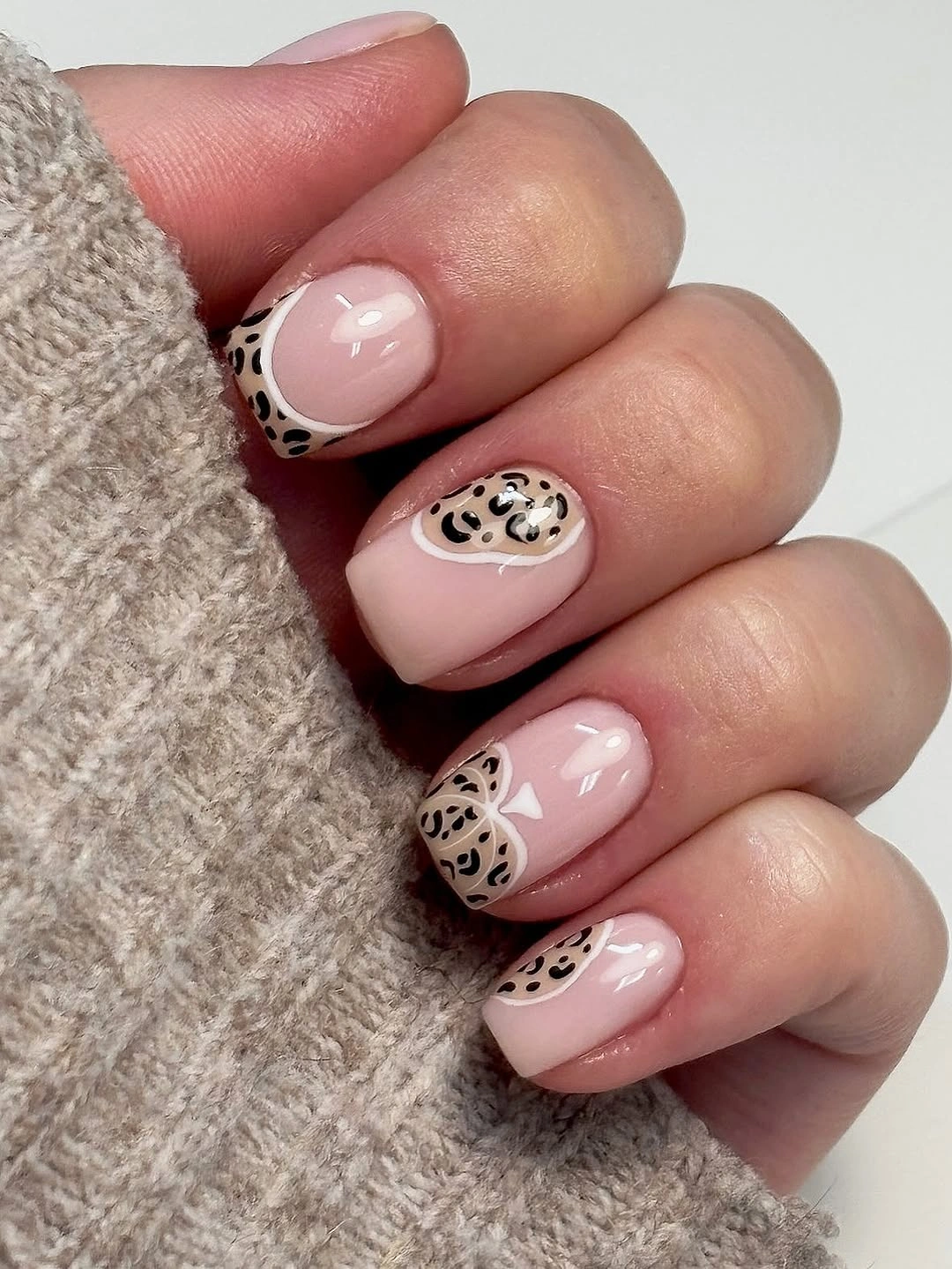 September nails color 2026 Pale Pink Nails With Leopard French Accents