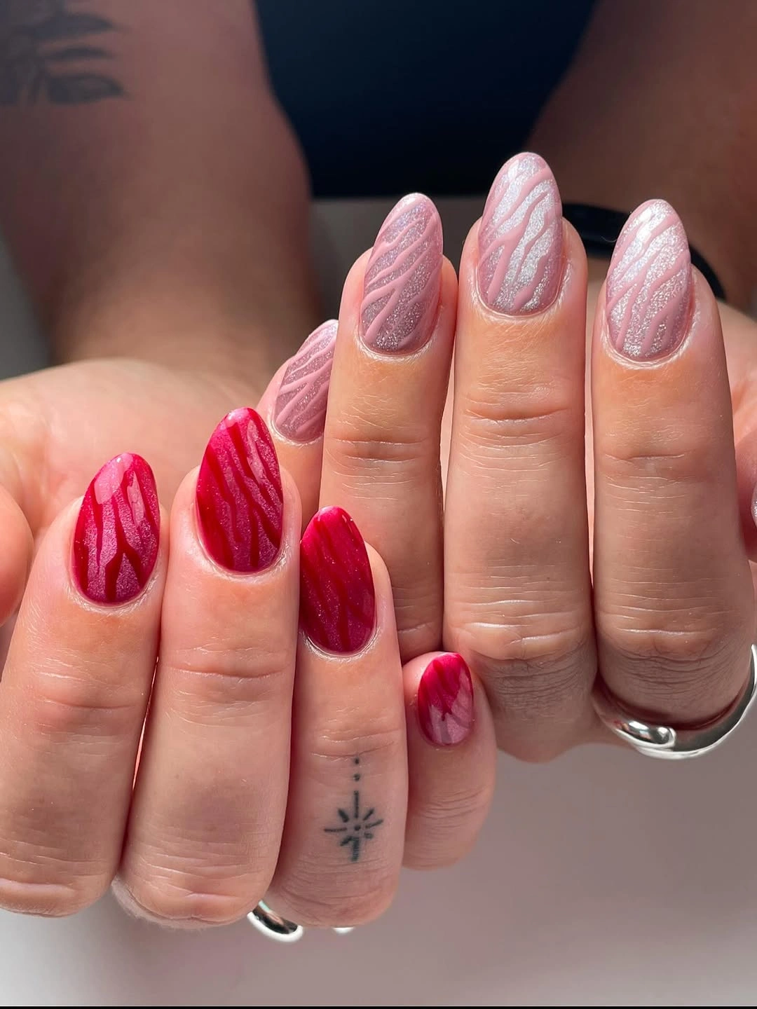 September nails color 2026 Textured Pink And Red Nails With Sweater Lines