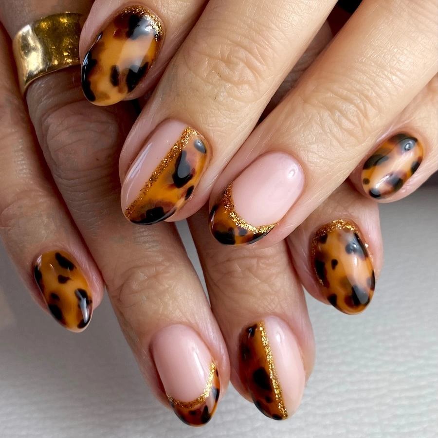 September nails color 2026 Tortoise French Nails With Soft Pink Contrast