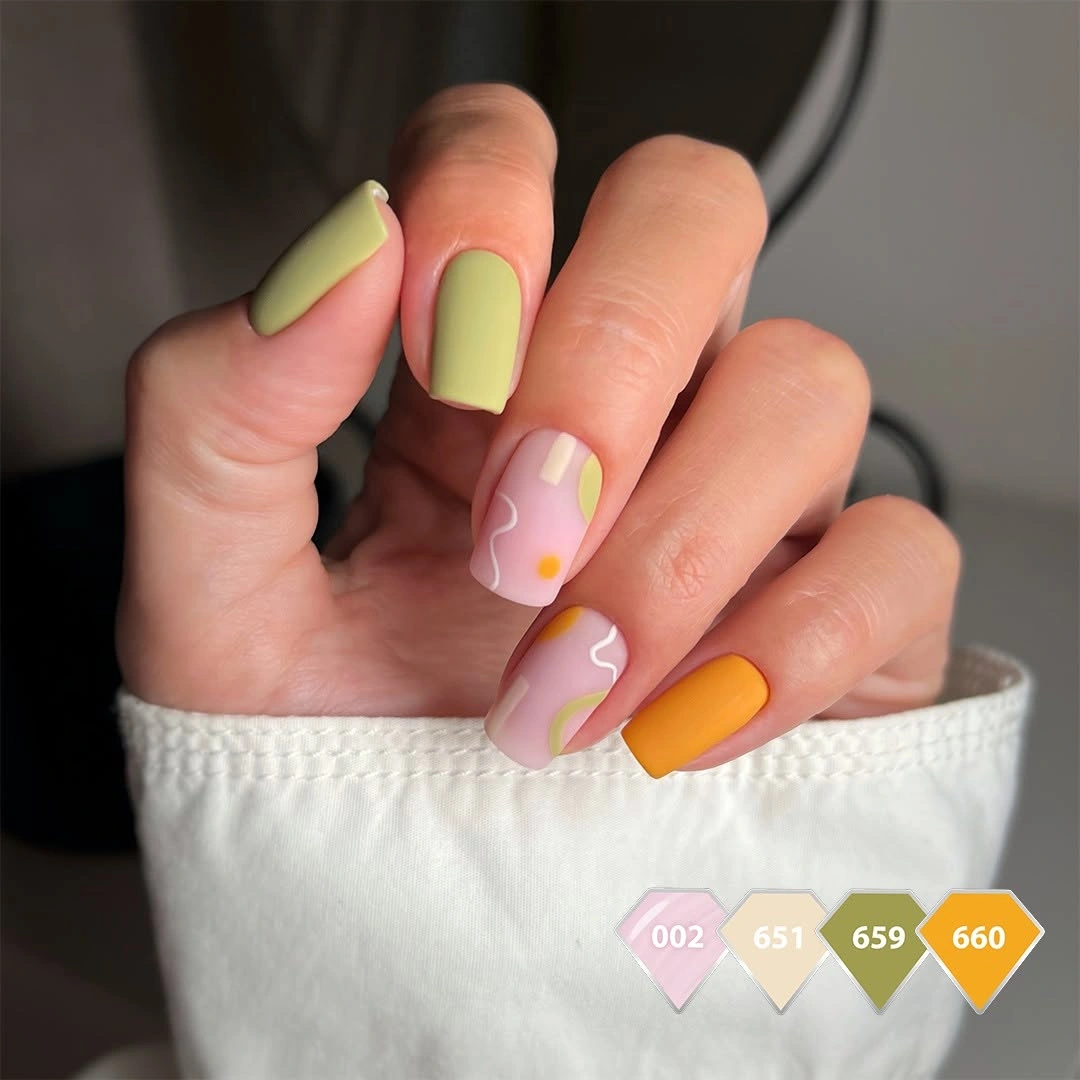 September nails color 2026 Muted Green And Mustard Nails With Daisy Accents