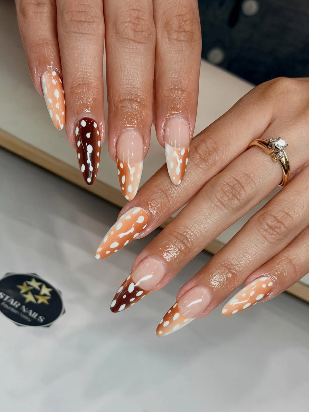 September nails color 2026 Brown Dotted Almond Nails With Caramel Sheer Bases