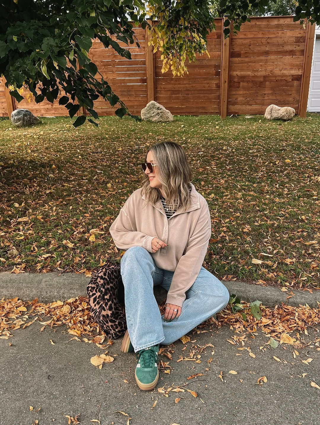 September outfits ideas 2026 Beige Sweater With Green Sneakers