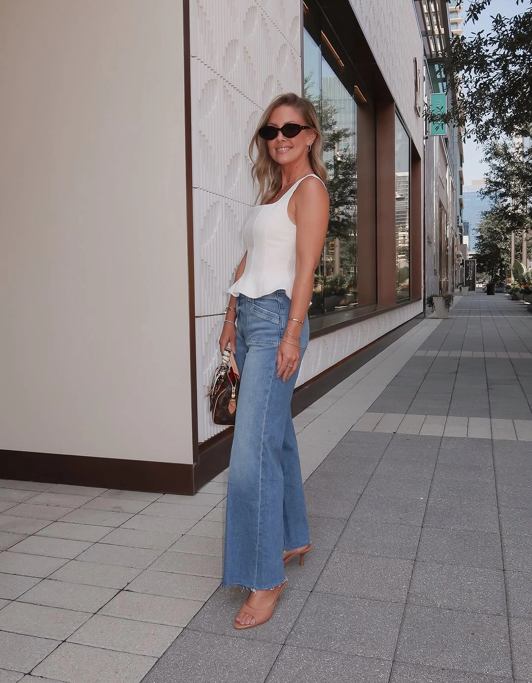 September outfits ideas 2026 White Tank With Long Flared Denim