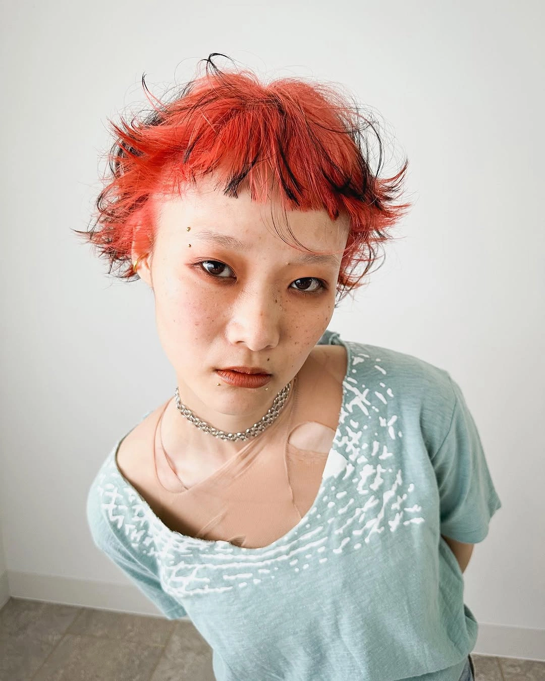 short bobbed hairstyle Textured Micro Bob with a Playful Fringe