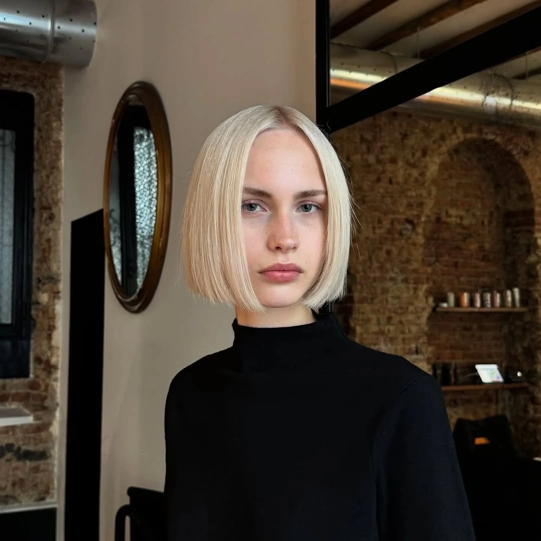 short bobbed hairstyle Platinum Blunt Bob with Editorial Simplicity
