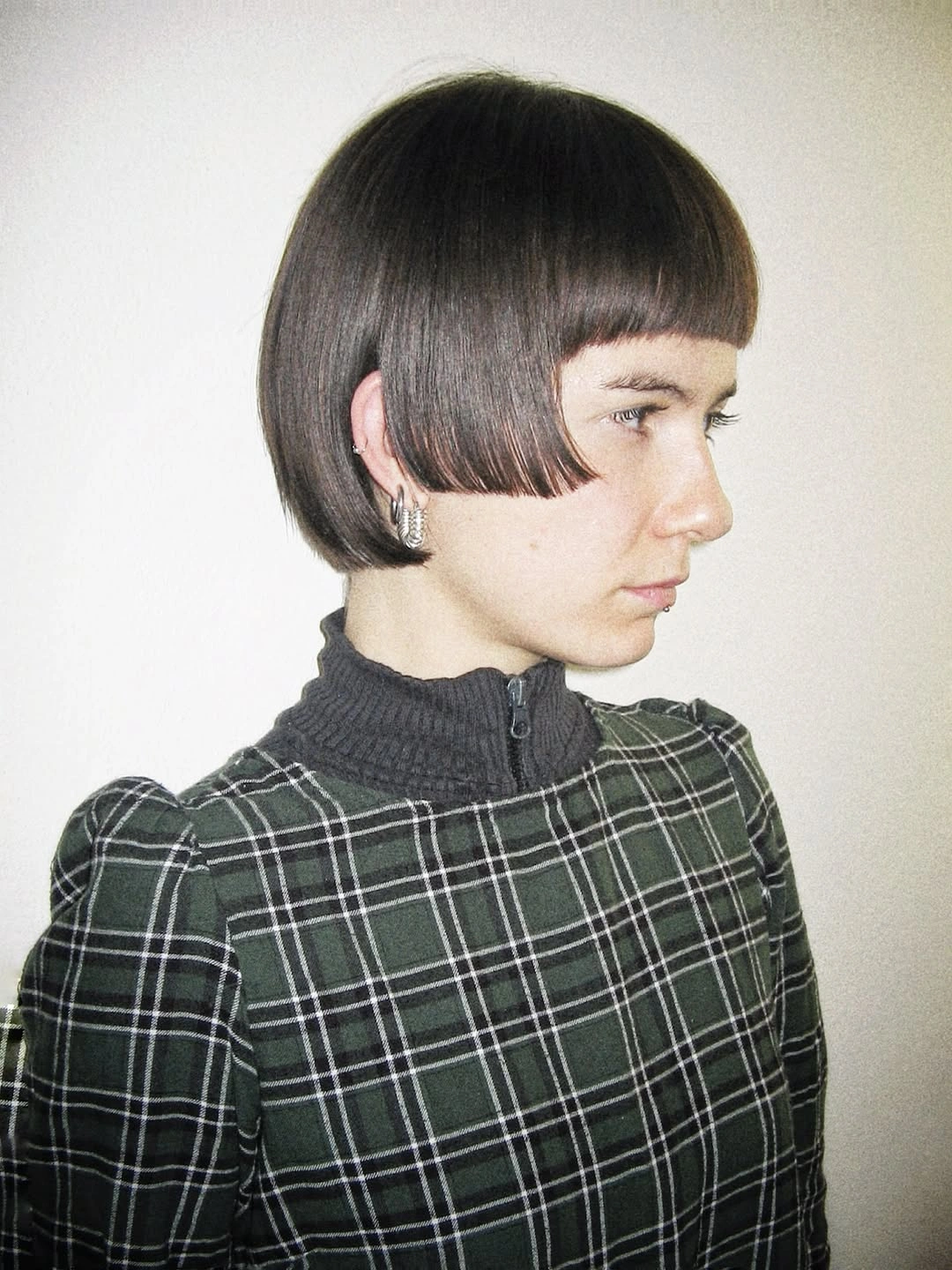 short bobbed hairstyle Graphic Micro Fringe Bob with Vintage Influence