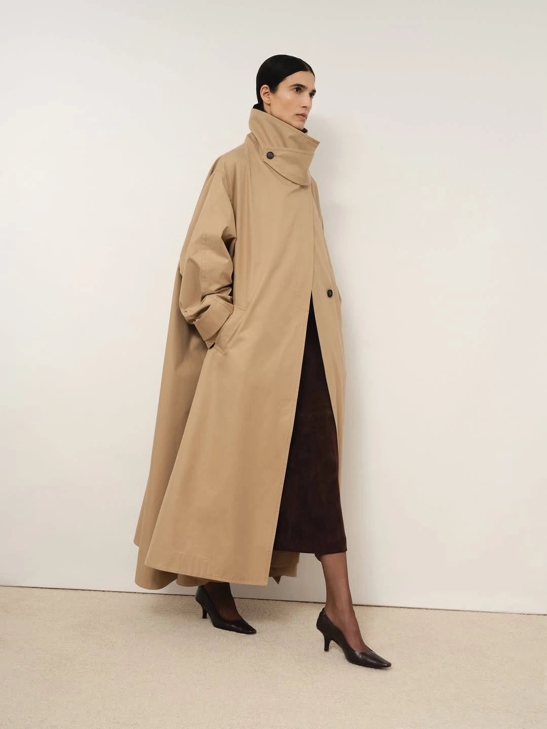 Trench coat fall outfits 2026 Modern Minimalism with a Sculptural High Collar