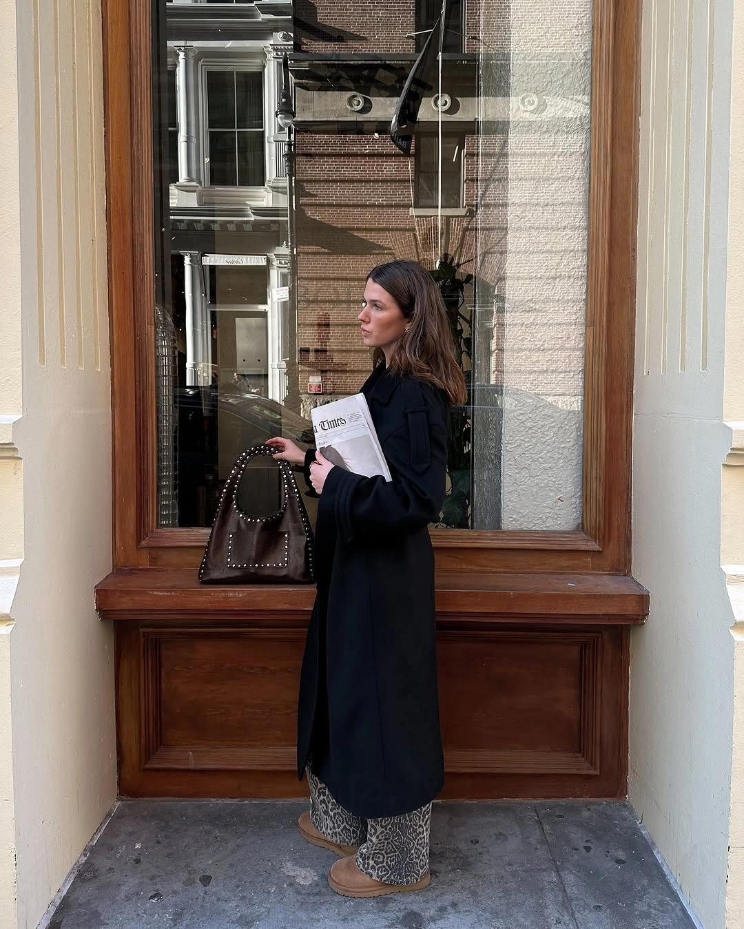 what are the best fall outfits for casual days? Long Black Coat with Relaxed Animal Print Elegance