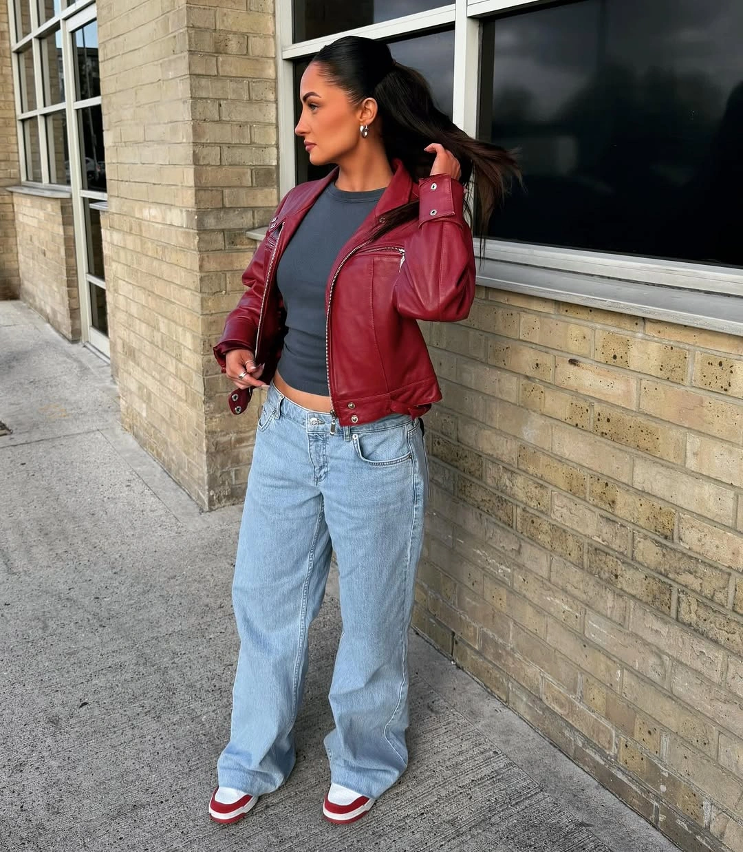 wide leg jeans outfit fall 2026 Light Denim And Burgundy Leather For A Bold Seasonal Update