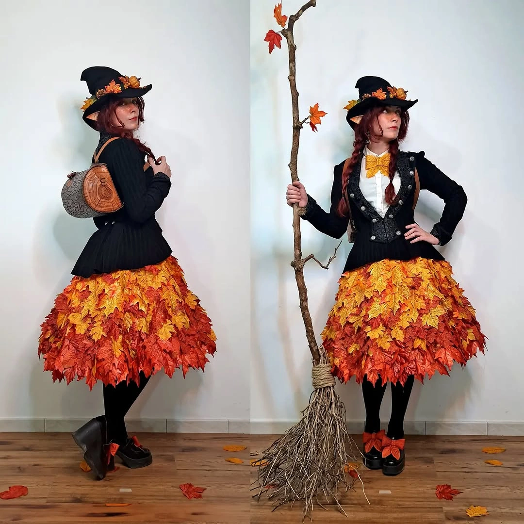Black witch costume with orange flame-colored skirt striped socks and broom