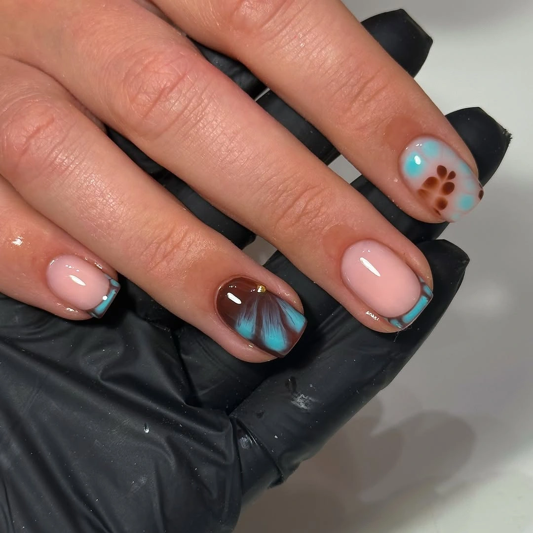 Short rounded square nails with chocolate pink and cool teal accents