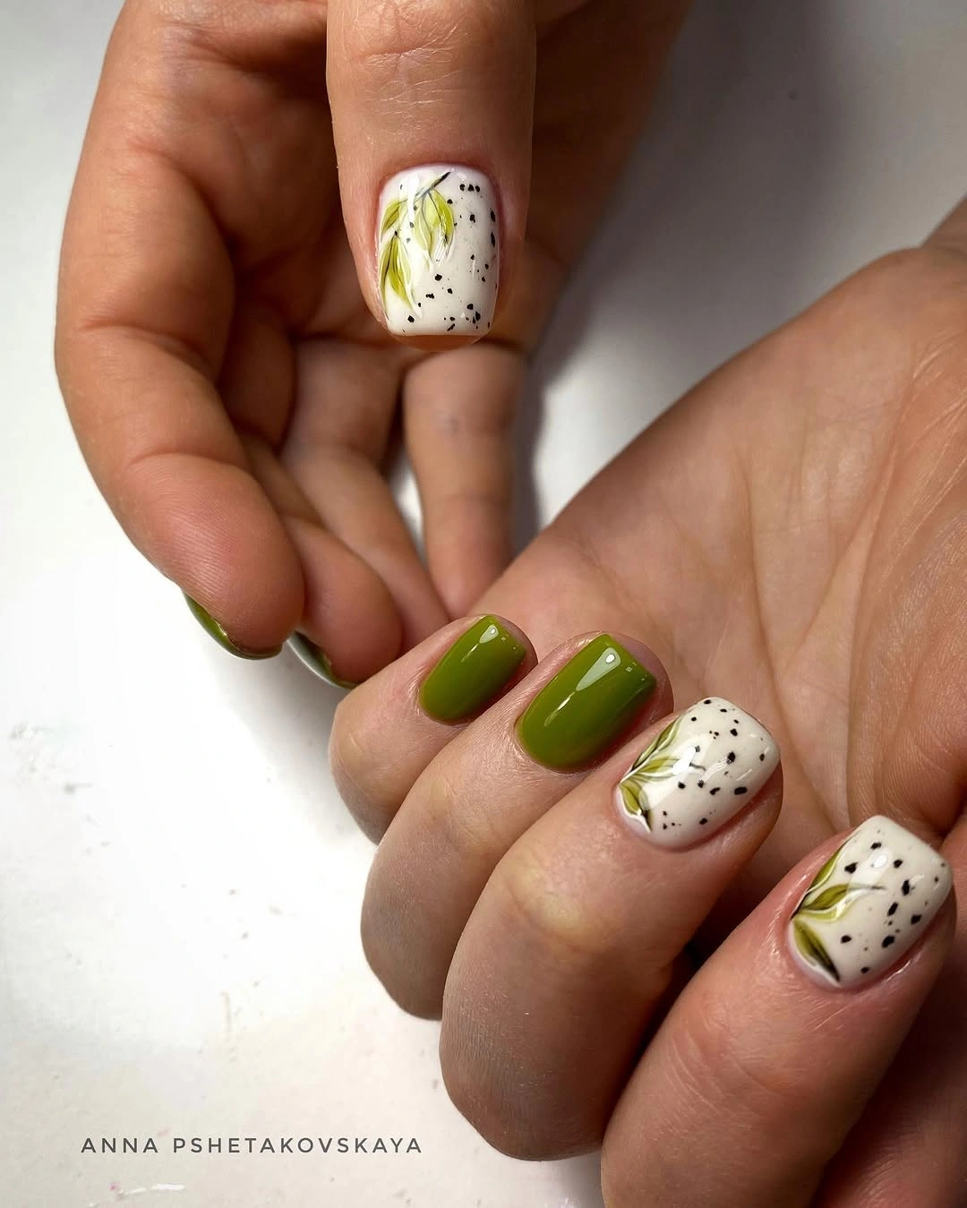 Olive Nails with Two Cream Speckled Accents