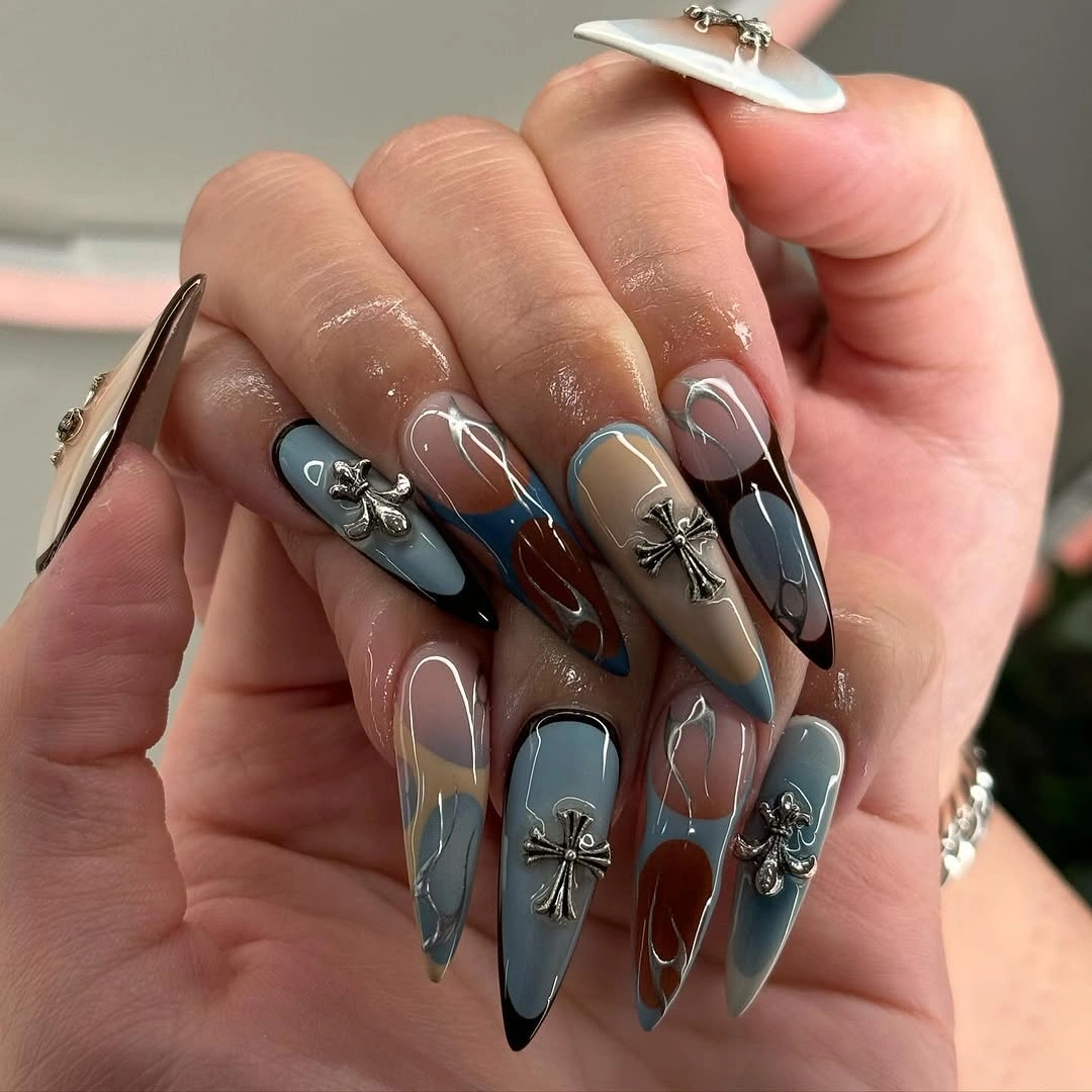 long almond gray-blue nails with smoky swirls and ornate silver accents