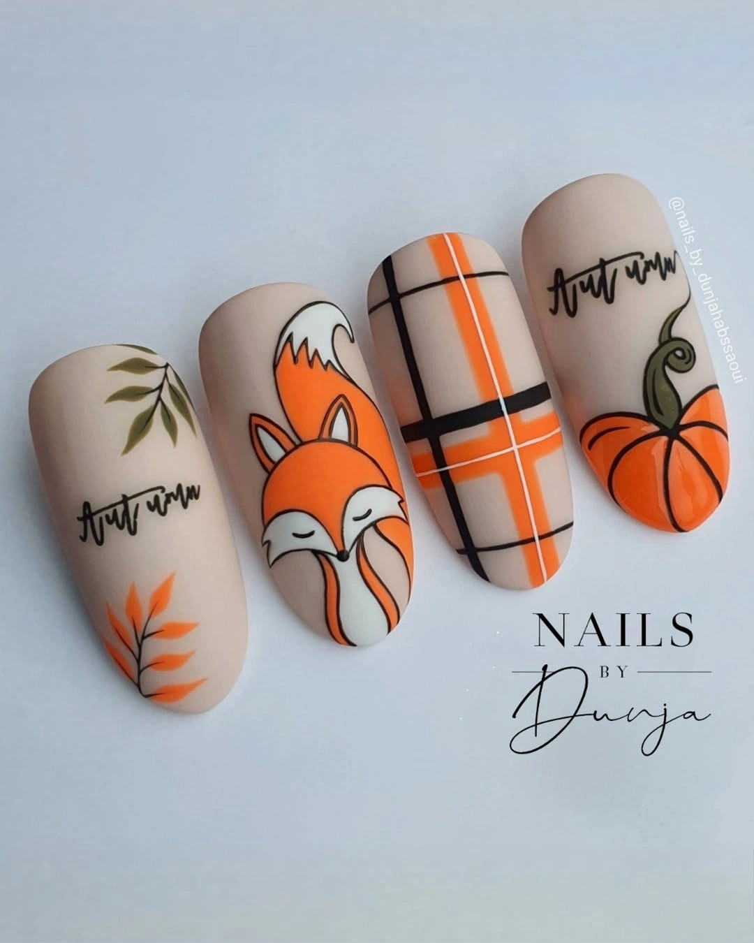 short nude tips with orange pumpkins, plaid, and fox detail