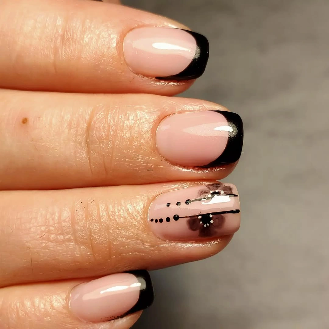 Short pink square nails with glossy black tips