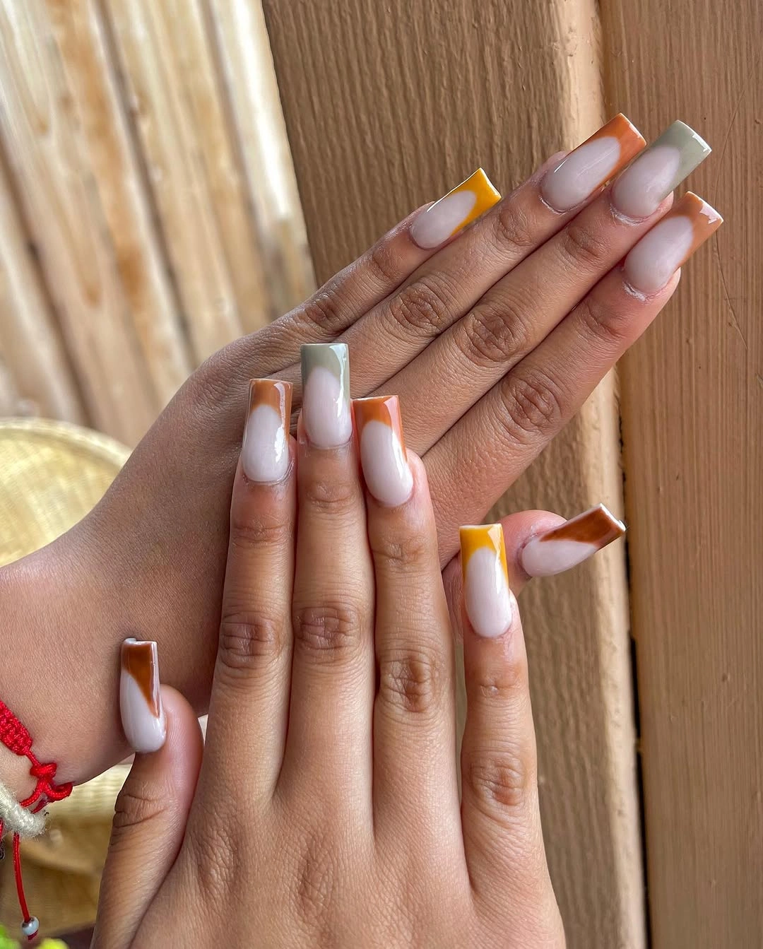 Milky square nails with muted curved corner tips