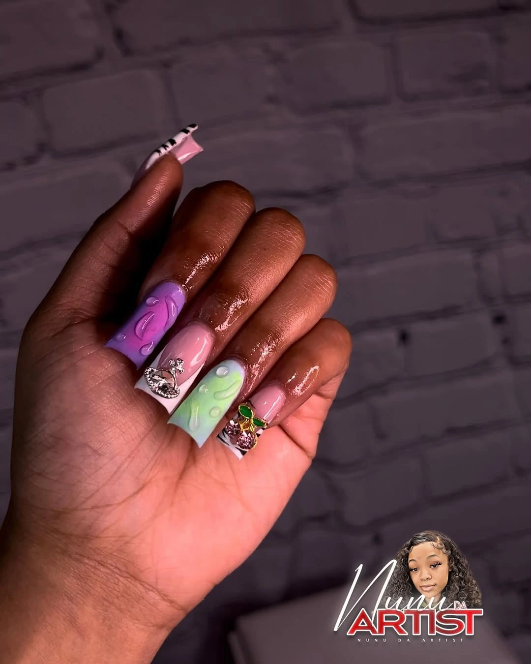 Pastel square nails with stripes and jewel-like accents