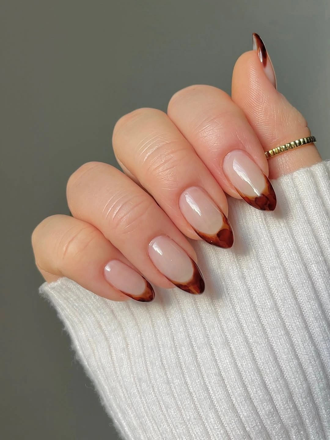Almond nails with simple tortoise French tips
