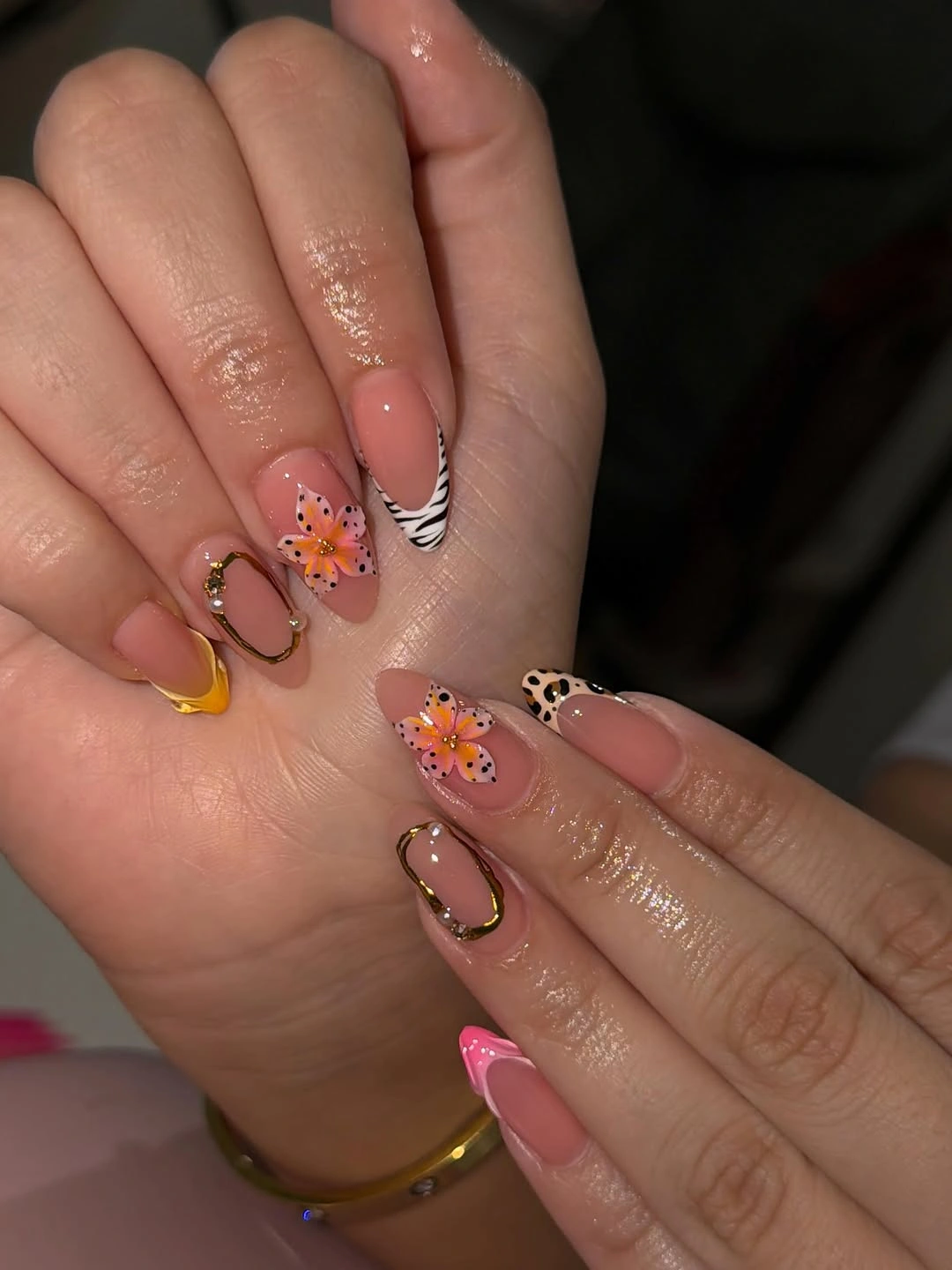 Almond nails with flowers animal print and gold lines