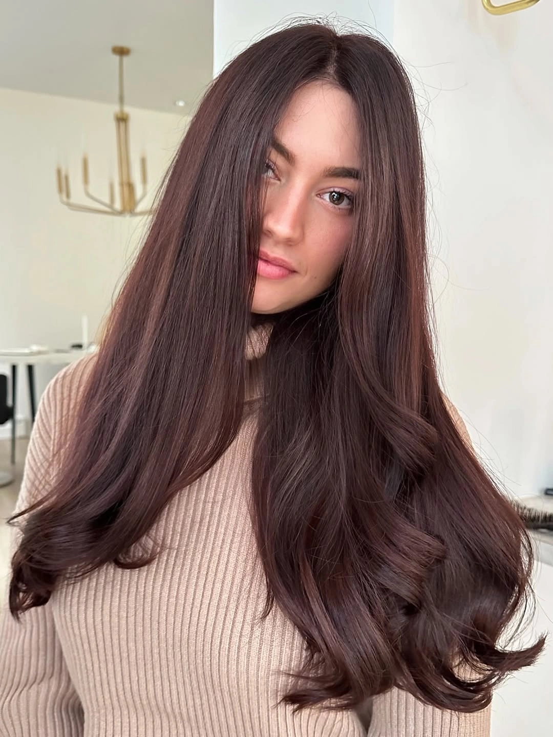 Long chocolate waves with a soft curtain parting