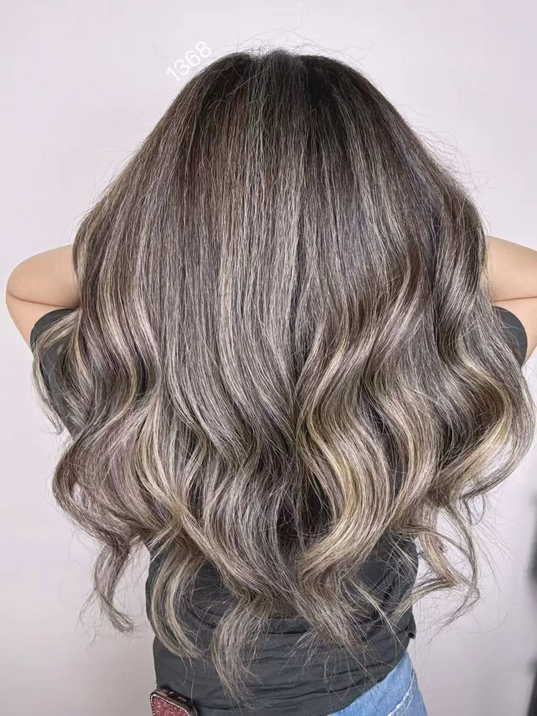 Cool ash brown waves with pale dimensional ribbons