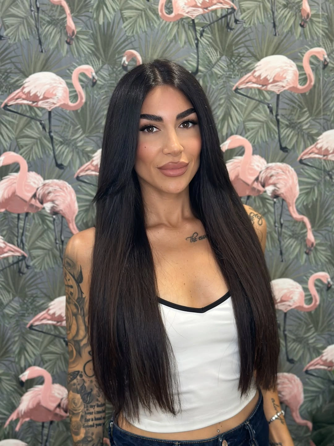 Very long espresso brown hair with a clean center part