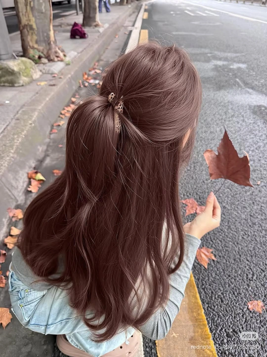 Loose half up waves in warm auburn brown hair