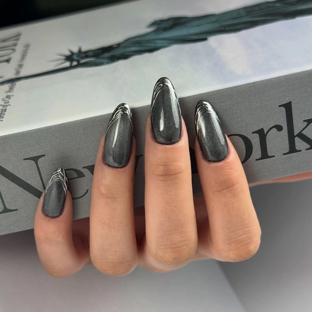 Medium graphite silver nails with a polished soft square shape