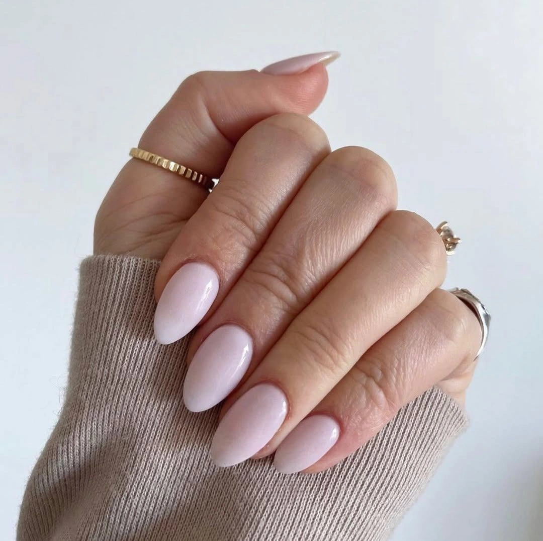 Medium pale blush almond nails with simple glossy finish