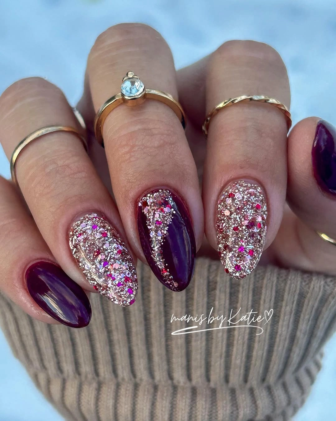 Burgundy almond nails alternating with pale silver pink glitter