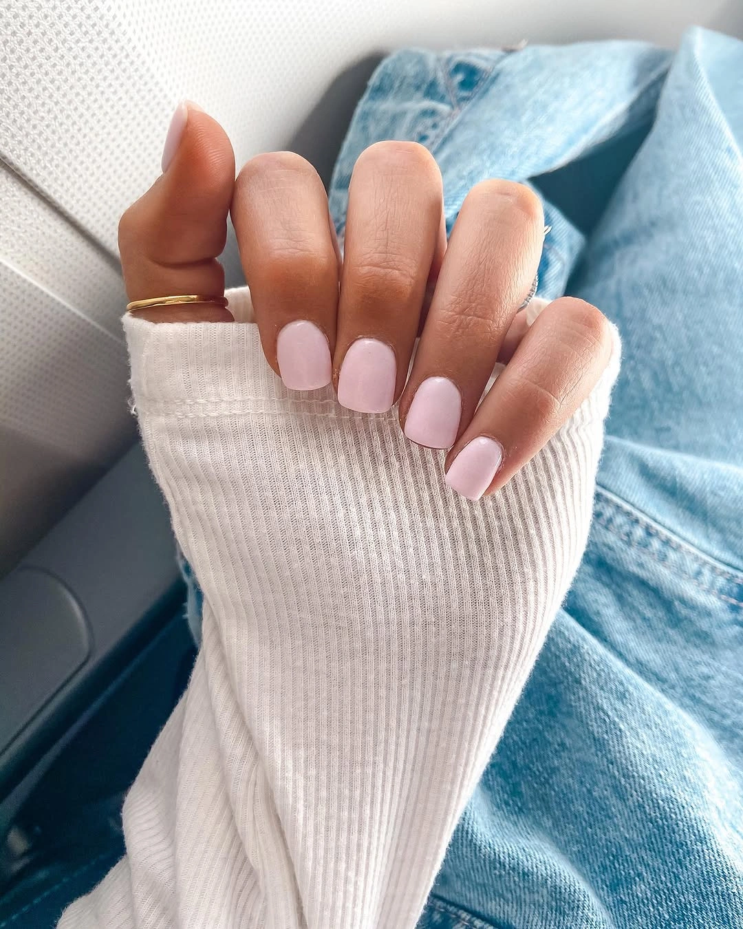 Medium pale pink almond nails with simple even color