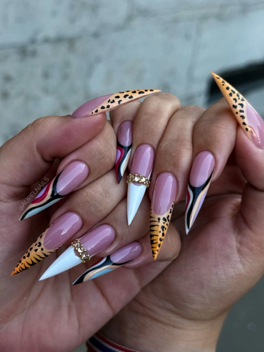 Long lavender stilettos with multicolor French and patterned tips