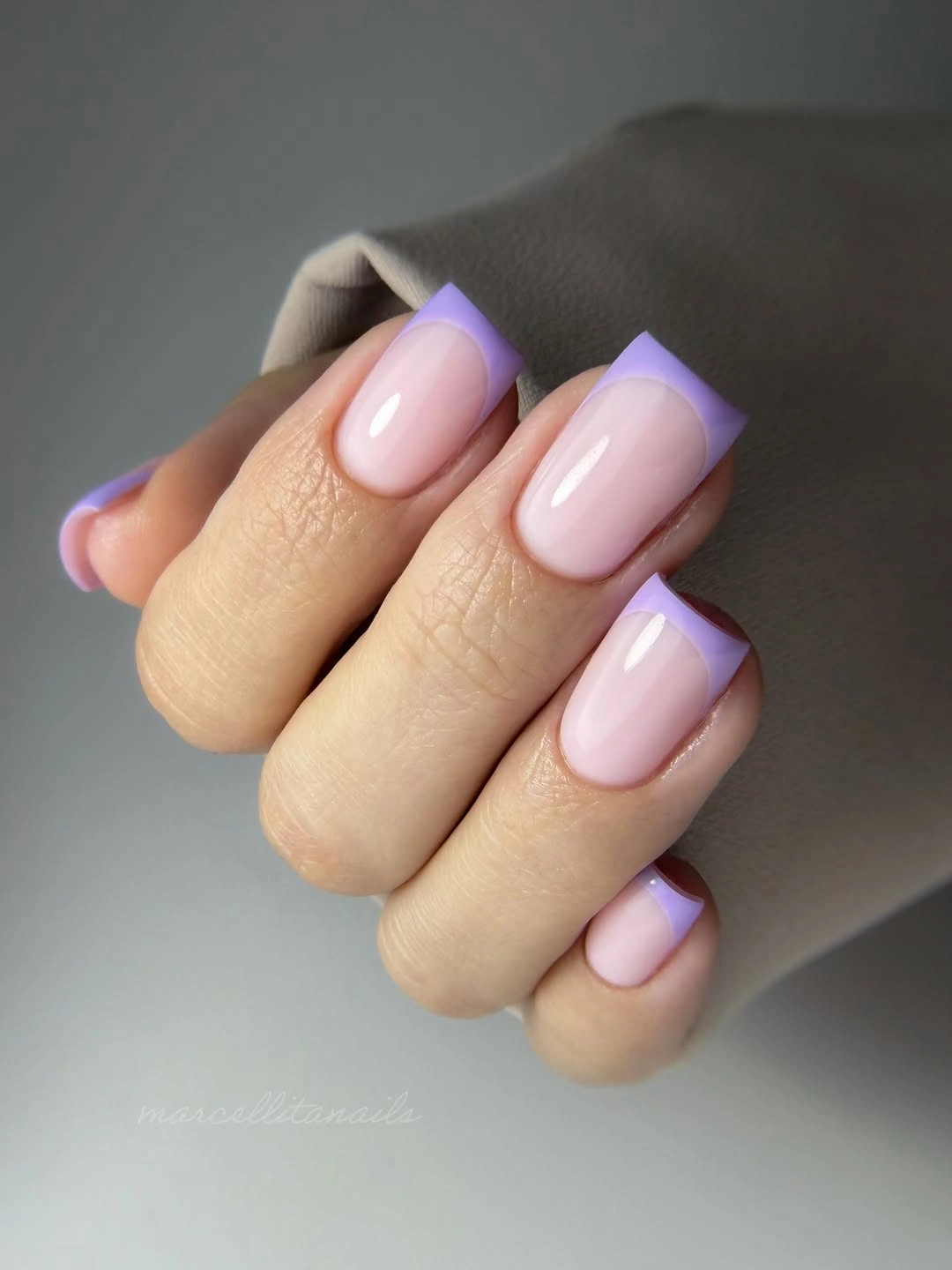 Medium pale pink nails with smooth lavender French tips